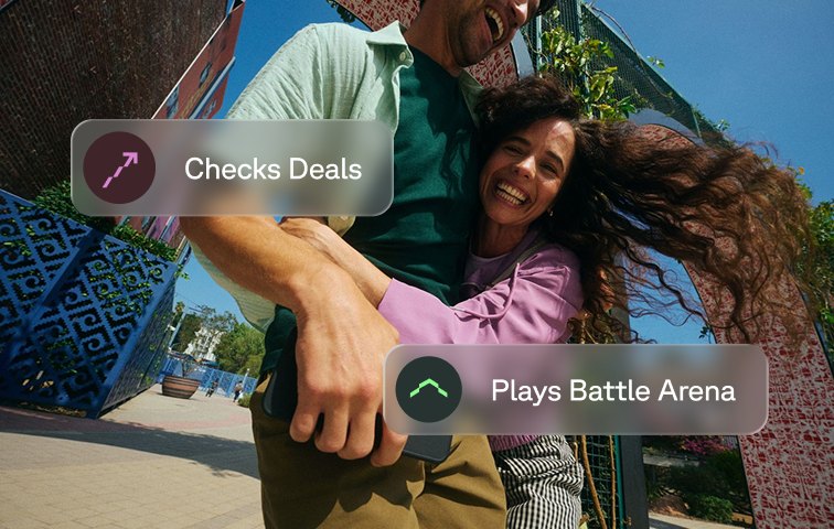 A couple laughing together, with labels “Checks Deals” and “Plays Battle Arena”